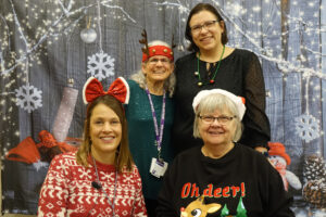 The organizers of a holiday party Memory Cafe.