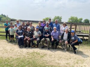 A group shot of the Memory Cafe participants at a ranch.