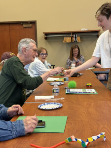 A group of people at a Memory Cafe.