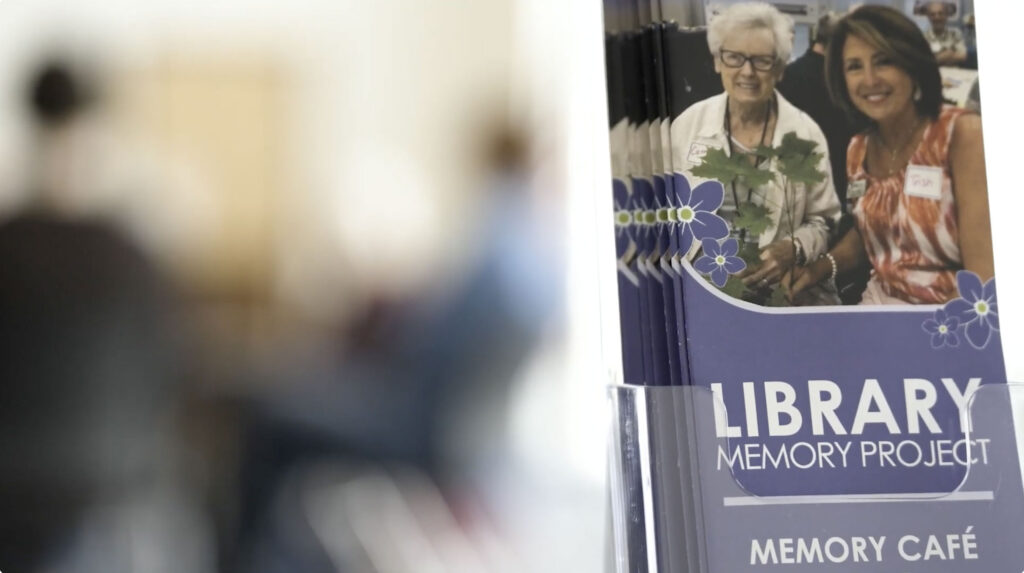 Memory Cafe brochures in a clear plastic rack